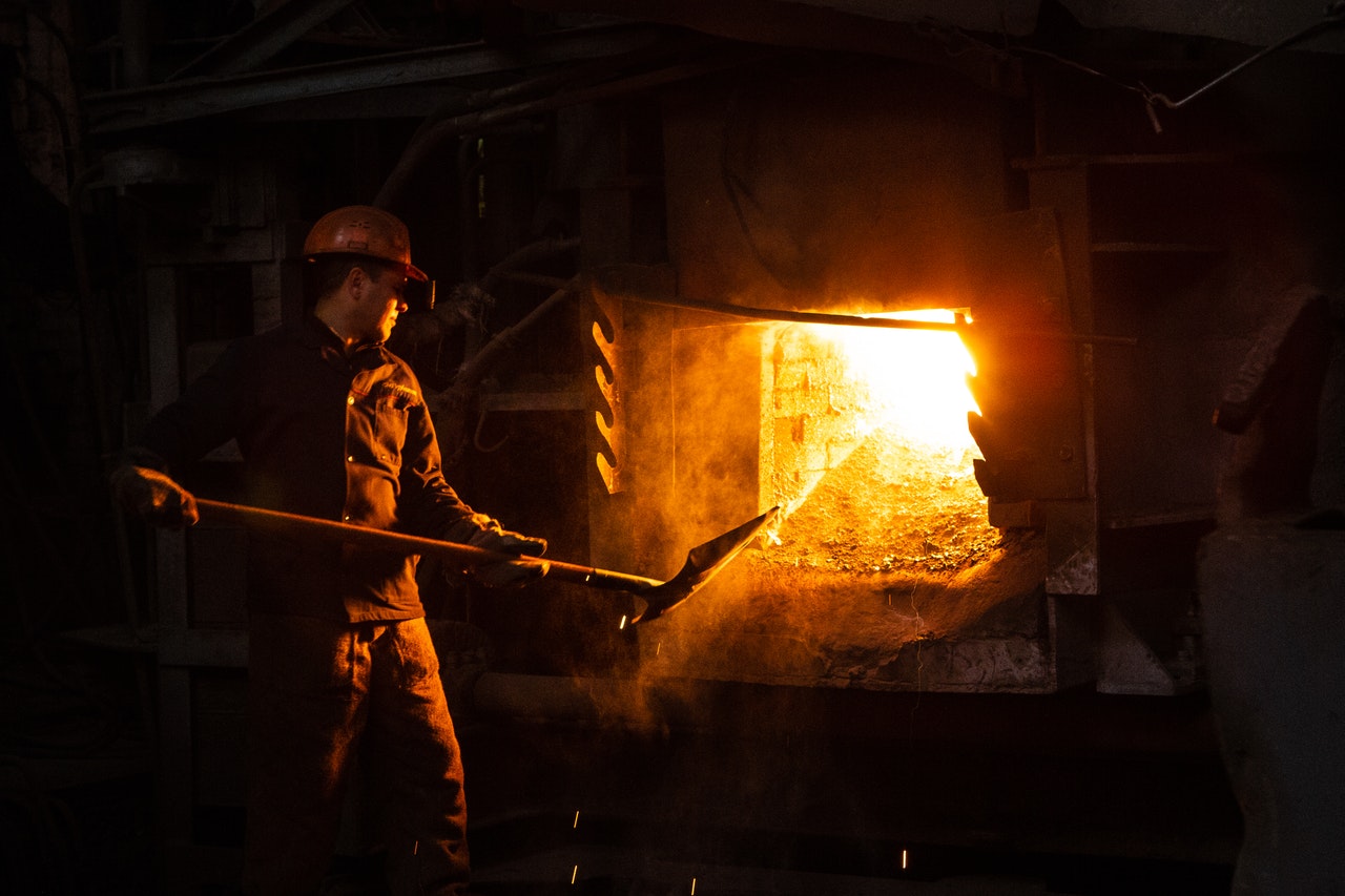 employee working on metal