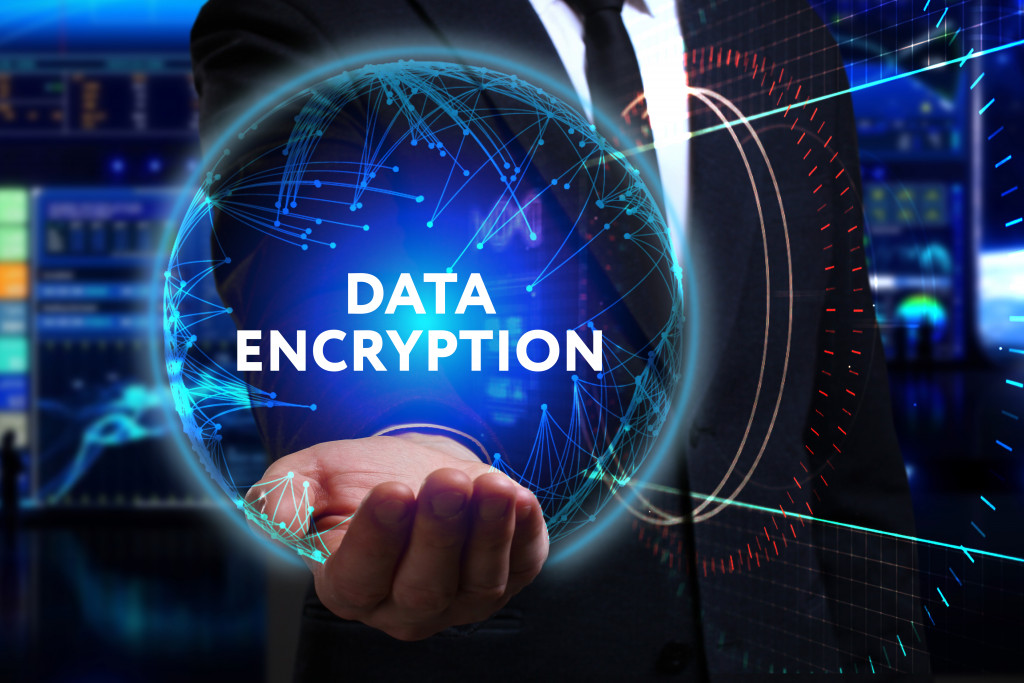 data encryption concept in a businessman's hand